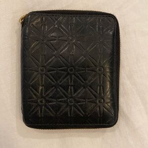 Comme des Garçons Embossed Zip-Around
Wallet